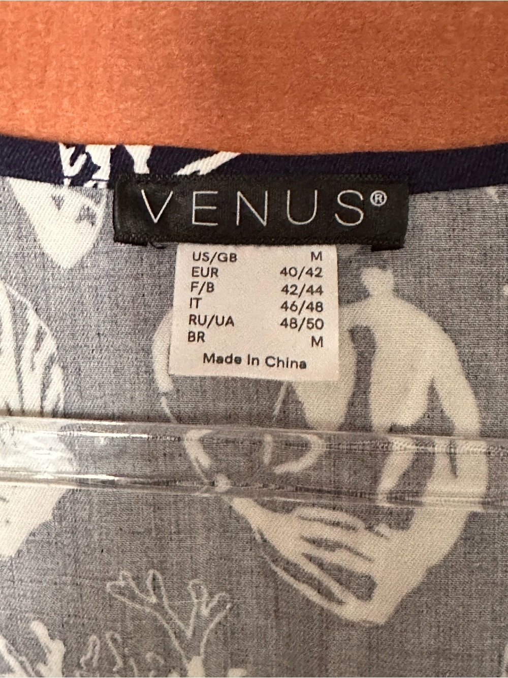 Venus Women's Ocean Romper featuring a navy blue seashell pattern - Picture 4 of 4